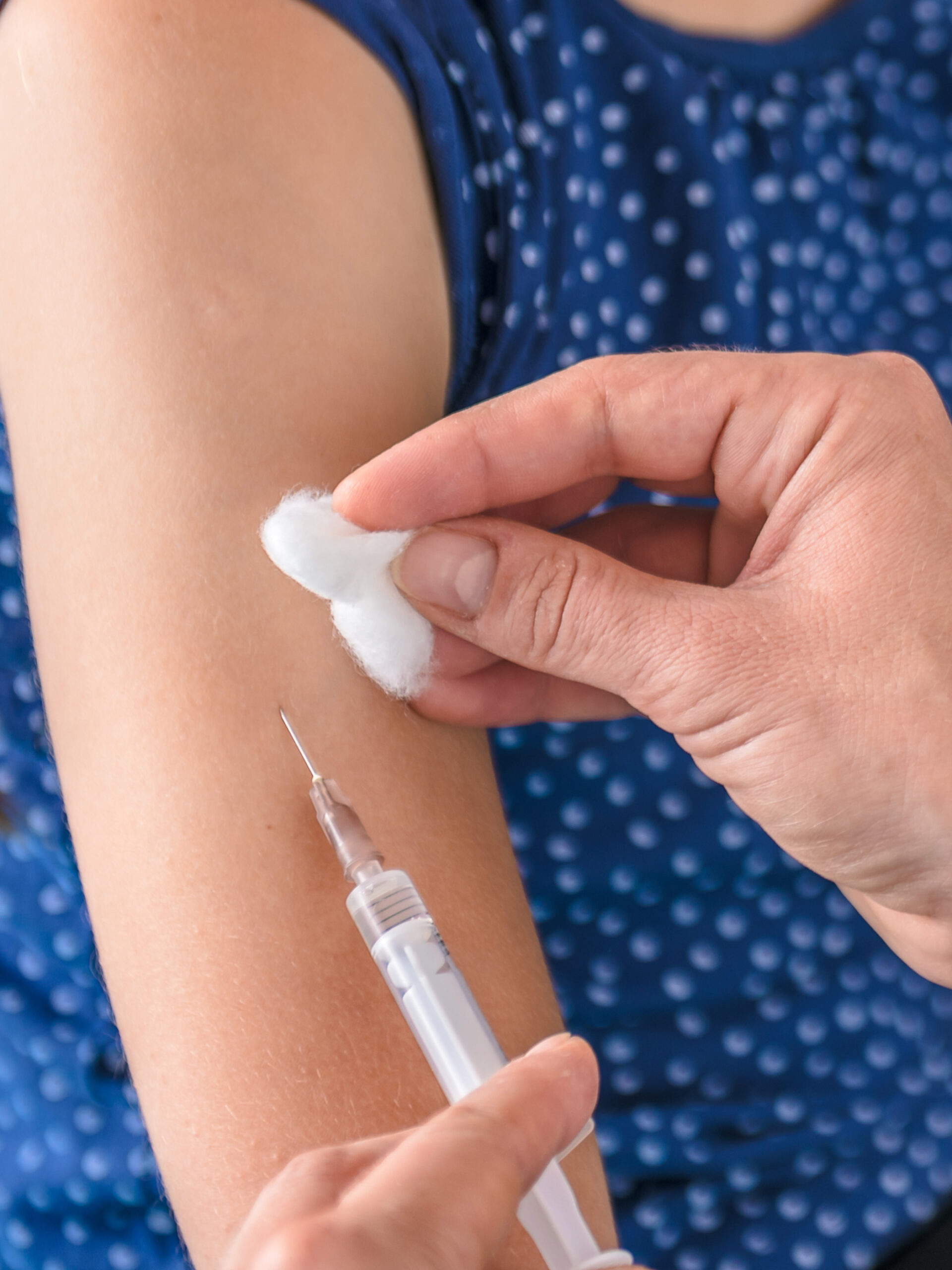 Girl receiving a flu shot