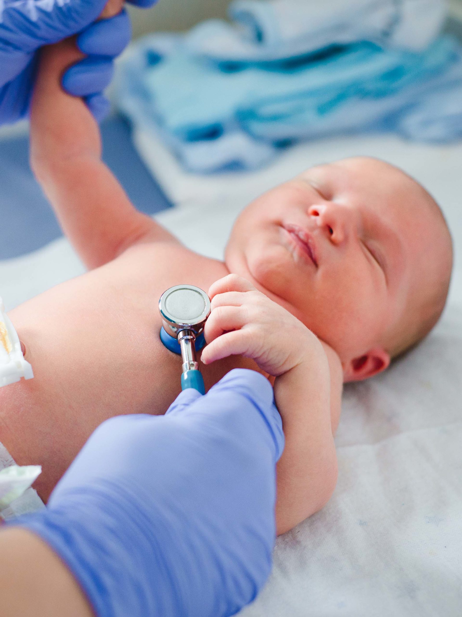 sleeping baby at a check up with pediatrician